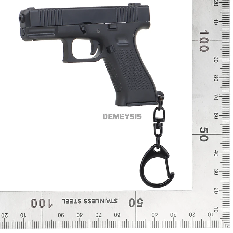Mini G45 Pistol Shaped Keychai - Photography Magazine 评论和价格